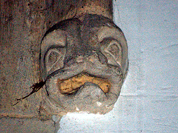 Grimacing head in the north arcade June 2012